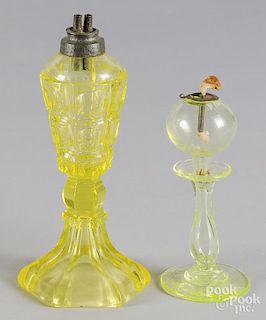 Two Vaseline glass fluid lamps, 19th c., 9'' h. and 6 1/2'' h.