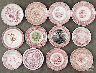 Eleven red transfer cup plates, 19th c., largest - 4'' dia.