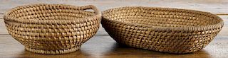 Two Pennsylvania rye straw baskets, 19th c., one with an open work handle, 14'' w. and 10'' dia.