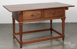 Pennsylvania walnut and cherry tavern table, ca. 1800, with two drawers and a stretcher base, 30'' h.