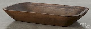 Large wooden trencher, 19th c., 5'' h., 30 1/2'' w., 18 1/2'' d.