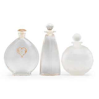 LALIQUE Three perfume bottles