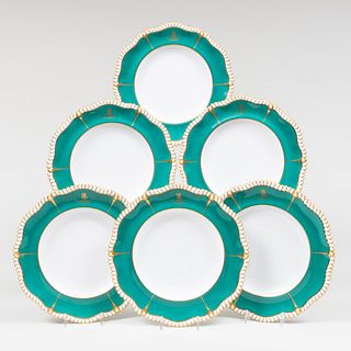 Group of Twelve Spode Green Ground and Gilt Armorial Porcelain Dinner Plates