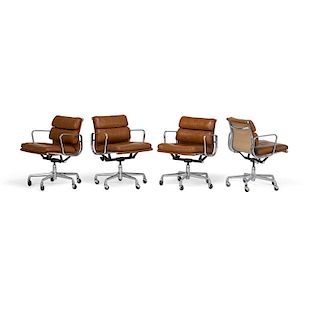 CHARLES AND RAY EAMES Four Soft Pad armchairs