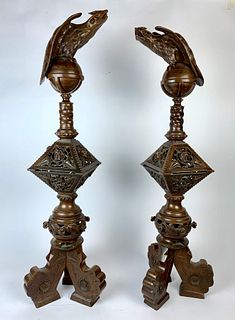 Pair of Bronze Fire Dogs with Eagle Tops