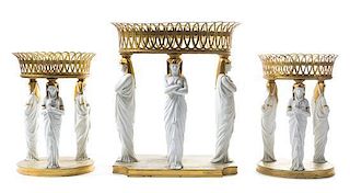 A French Gilt Bronze and Parian Table Garniture Height of tallest 16 x width 14 inches.