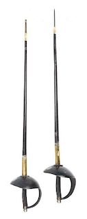 A Pair of French Fencing Sabers Length 42 inches.