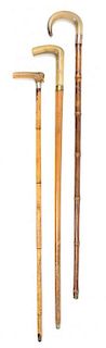 Three Sword Canes Length of longest 35 1/4 inches.