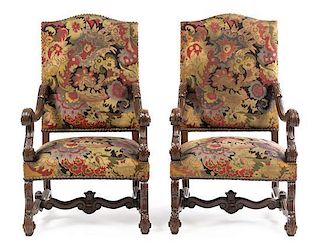 * A Pair of Louis XIV Style Walnut Fauteuils Height 47 1/2 x width 26 x depth 27 inches.