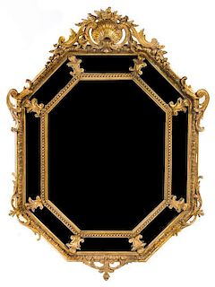 * A Regence Style Giltwood Mirror Height 55 1/2 inches.