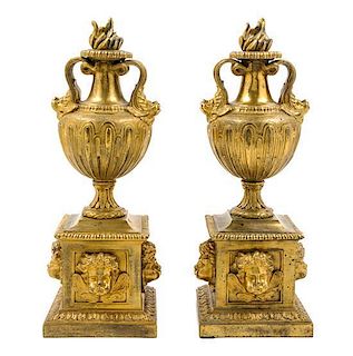 A Pair of French Gilt Bronze Chenets Height 15 1/2 inches.