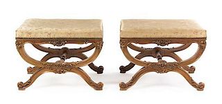 A Pair of Louis XVI Style Gilt Walnut Tabourets Height 18 x width 24 1/4 x depth 16 1/2 inches.