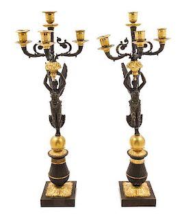 A Pair of Empire Gilt and Patinated Bronze Four-Light Candelabra Height of each 26 1/2 inches.