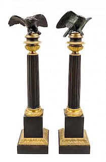 A Pair of Empire Gilt and Patinated Bronze Ornaments Height 25 1/2 inches.