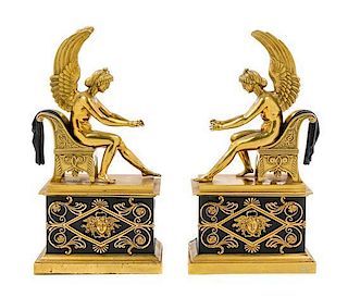 A Pair of Empire Gilt and Patinated Bronze Chenets Height of each 14 1/8 inches.