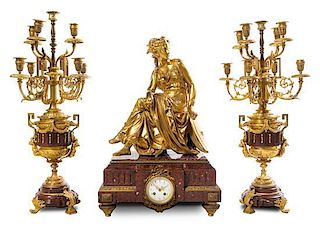A Large French Gilt Bronze and Marble Clock Garniture Height of candelabra 30 1/2 inches.