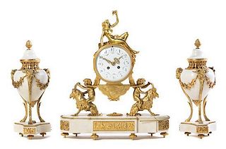 A French Gilt Bronze and Marble Clock Garniture Height of clock 20 inches.