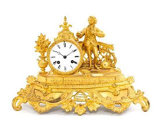 A French Gilt Metal Figural Mantel Clock Height 10 inches.