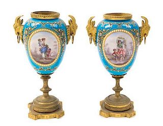 A Pair of Sevres Style Gilt Bronze Mounted Porcelain Urns Height 7 3/4 inches.
