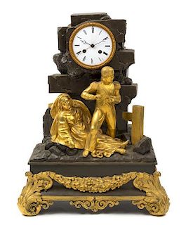 * A French Gilt and Patinated Bronze Mantel Clock Height 18 3/4 inches.