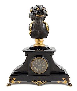 A French Gilt and Patinated Bronze and Slate Mantel Clock Height 23 1/2 inches.