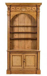 A French Provincial Pine Bookcase Height 92 1/4 x width 43 1/2 x depth 14 1/4 inches.