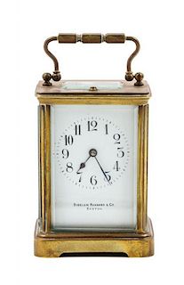 * A French Gilt Bronze Carriage Clock Height 5 1/8 inches.