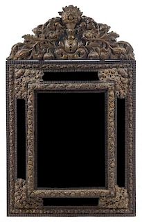 A Dutch Baroque Repousse Metal Mounted Mirror Height 50 x width 29 inches.