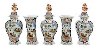 * A Dutch Pottery Five-Piece Garniture Height of jars 15 inches.