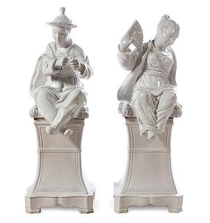 A Pair of Italian Monochrome Glazed Figures Height 39 3/4 inches.