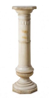 A Continental Carved Marble Pedestal Height 42 inches.