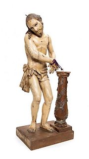 A Carved and Painted Wood Figure of Christ Height 24 1/4 inches.