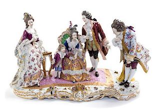 A German Porcelain Lace Figural Group Height 16 x width 27 1/2 inches.