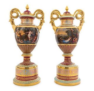A Pair of Vienna Porcelain Urns on Stands Height 21 3/4 inches.