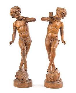 * Two Continental Carved Wood Figures Height of taller 53 1/2 inches.