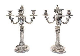 A Pair of Continental Silvered Bronze Three-Light Candelabra Height 16 1/2 inches.