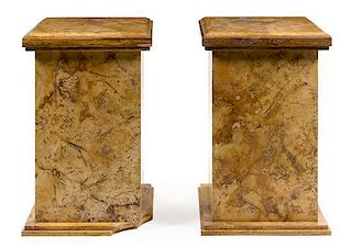 * A Pair of Continental Marble Pedestals Height 33 x width 21 3/4 x depth 21 3/4 inches.