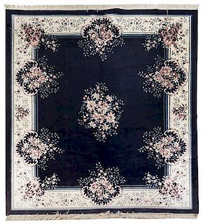 * A Chinese Wool Rug 9 feet 1/2 inches x 7 feet 10 inches.
