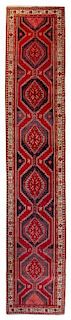 * A Caucasian Style Wool Runner 14 feet 3 inches x 3 feet 4 1/2 inches.