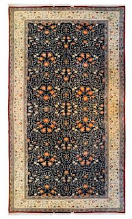 * An Indo-Persian Wool Rug 9 feet x 12 feet.