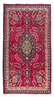 * A Tabriz Wool Rug 6 feet 9 1/2 inches x 4 feet 1 1/4 inches.