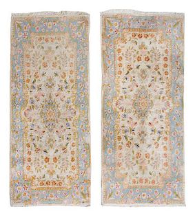 * A Pair of Kirman Wool Rugs 4 feet 2 inches x 1 foot 11 inches.