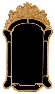 A George III Style Giltwood Mirror Height 67 3/4 x width 38 1/4 inches.