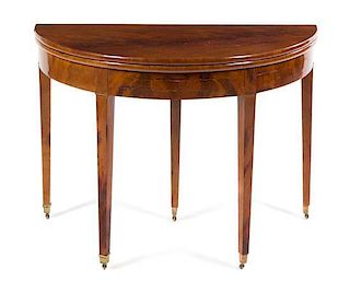 A George III Mahogany Flip-Top Table Height 29 1/4 x width 39 1/4 x depth 19 1/2 inches (closed).