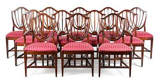 * A Set of Twelve Hepplewhite Style Mahogany Dining Chairs Height 38 inches.