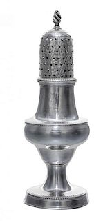A George III Silver Caster, Hester Bateman, London, 1783, having a spiral twist finial and beaded edges.