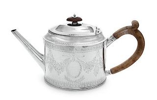 A George III Silver Teapot, Hester Bateman, London, 1783, of oval form, having a tapering spout and a scrolled wood handle, work