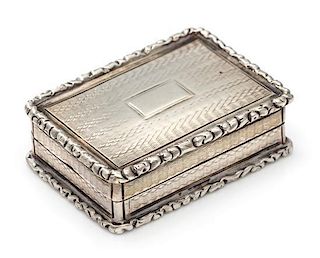 A William IV Silver Vinaigrette, John Bettridge, Birmingham, 1832, the case with an engine turned and volute decorated border.