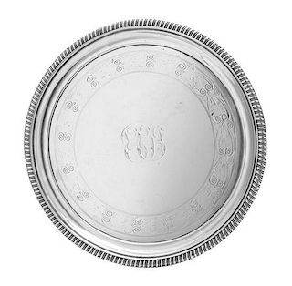 A George III Silver Salver, Thomas Hannam & John Crouch, London 1807, having a gadrooned rim, centered by an engraved monogram w
