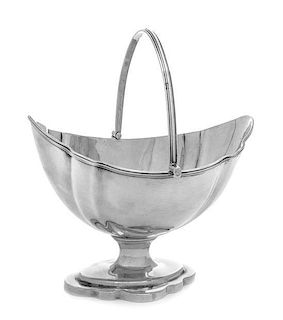 A George III Silver Sugar Basket, William Abdy II, London, 1794, with a swing handle, a threaded rim and a pedestal foot.